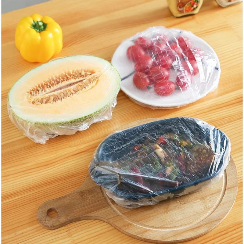 Disposable food - grade kitchen household PE leftover food, fruits and vegetables dust - proof universal insurance film cover.