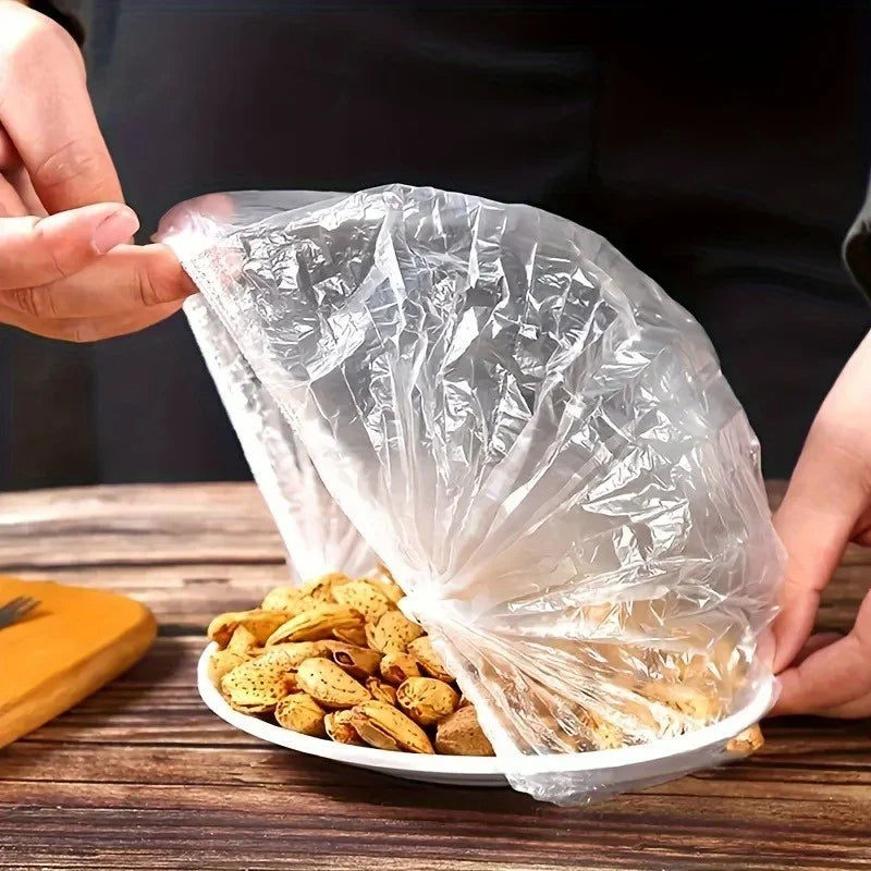 Disposable food - grade kitchen household PE leftover food, fruits and vegetables dust - proof universal insurance film cover.